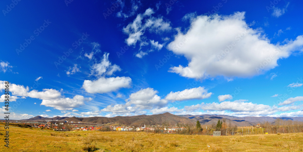 Spring landscape after rain, intense blue sky and clouds Spring landscape after rain, intense blue sky and clouds