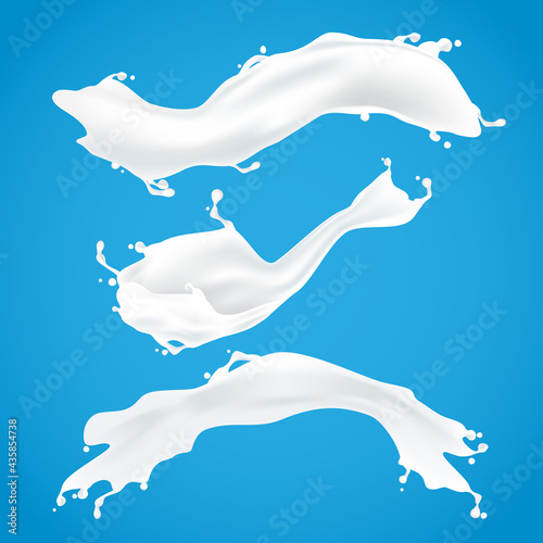 Milk plashes isolated on blue background. fresh milk illustration.