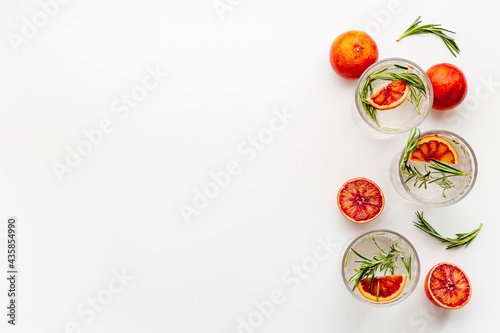 Citrus juice and slices of grapefruit and red oranges. Overhead view