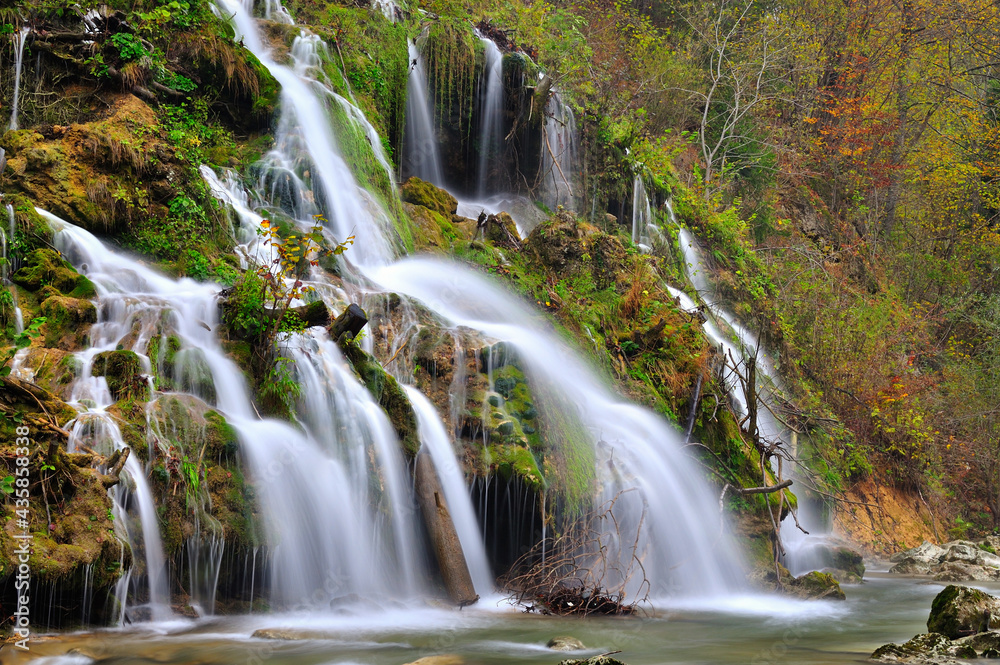 Mountain waterfall in autumn. Mountain waterfall in autumn.