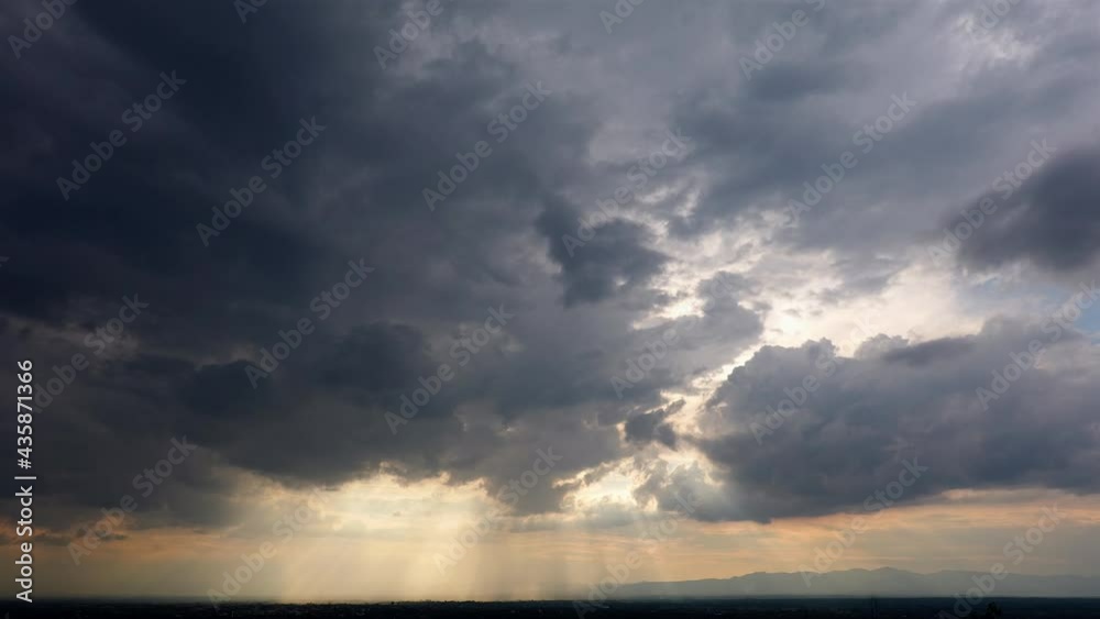 Time-lapse of The dark expanse of the sky, a huge and, foretelling the arrival of a big, stormy rain and thunderstorm. This atmospheric display adds a dramatic touch to the natural environment. Time-lapse of The dark expanse of the sky, a huge and, foretelling the arrival of a big, stormy rain and thunderstorm. This atmospheric display adds a dramatic touch to the natural environment.