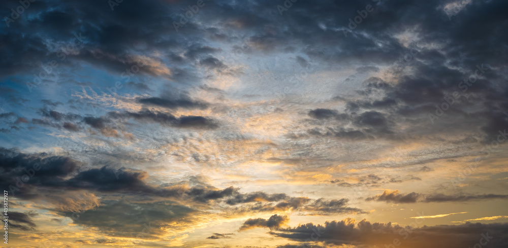 tranquil shot of vibrant colored sky with clouds at sunset ui design background