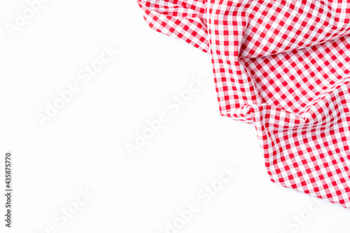 Tablecloth red and white checkers on a white background. Fabric crumpled Isolated top view with copy space for the website food menu.