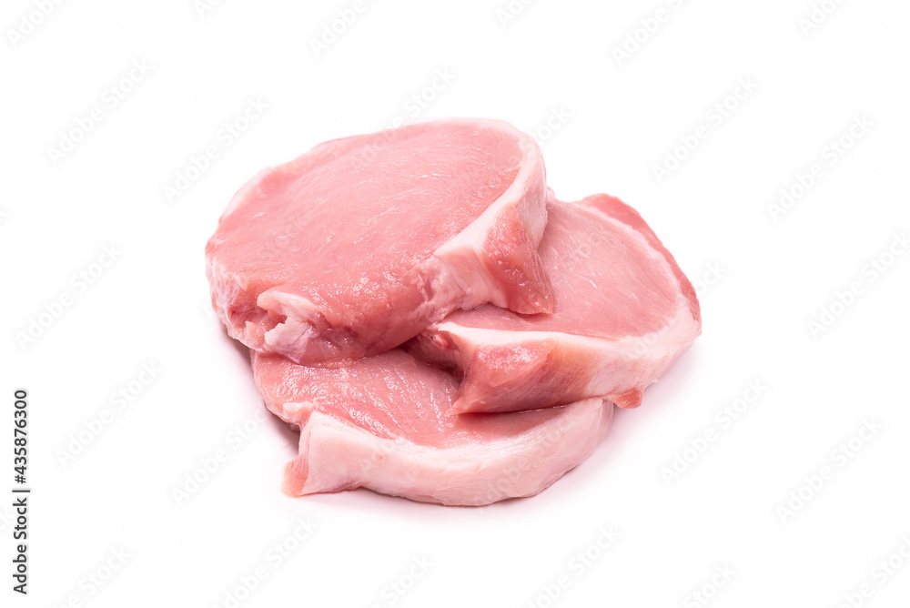 Raw pork pieces isolated on a white background.