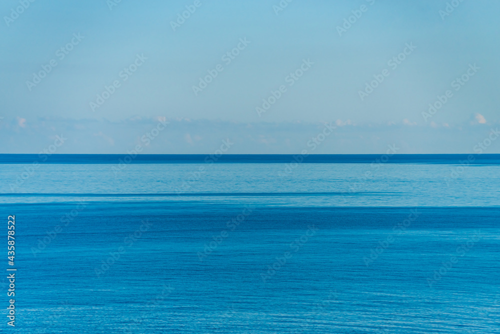 Plain blue sea and sky for background, copy space 
