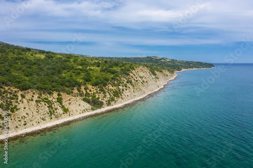 Aerial view to beautiful rocky coastline © niki spasov