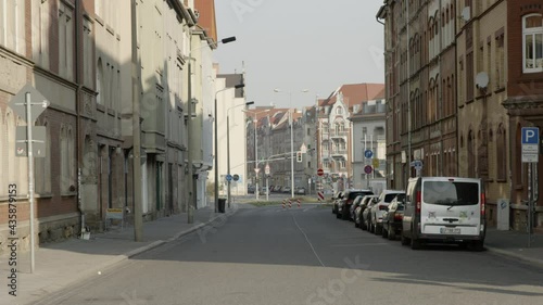 Wallpaper Mural Lockdown Of A Quiet City Street In A Historic German Neighborhood, With Brick Townhomes On Both Sides Of The Street - Erfurt, Germany Torontodigital.ca