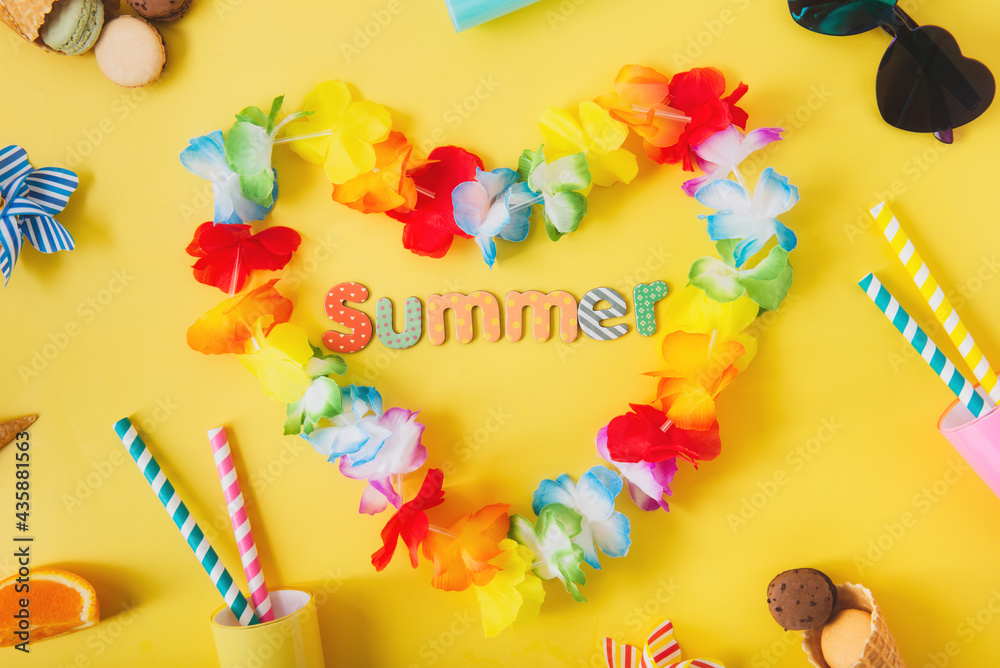 Top view flat lay of Hawaii flower necklaces in shape of heart with Summer word, cocktail glasses with straws, sunglasses, waffle cones, macaroon cakes, orange slices on yellow background. party mood.