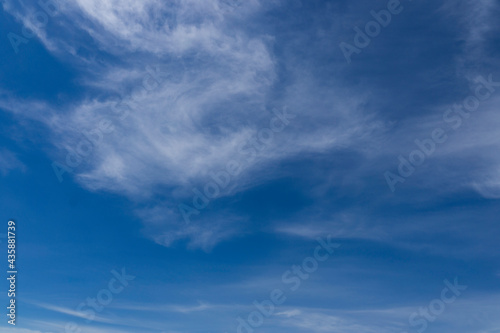Blue sky with white clouds © Adriana