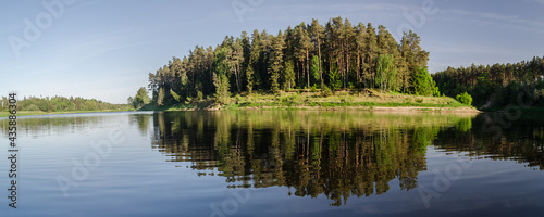 Fototapeta Naklejka Na Ścianę i Meble -  Beautiful river bend and forests on a sunny spring day.