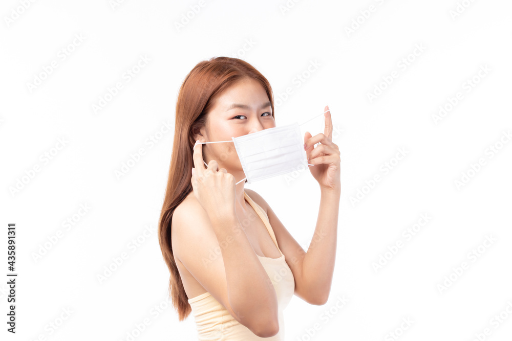Young Asian woman wearing face mask, mask mouth protect filter pm2.5 anti pollution, anti smog and protection covid 19. Air pollution, environmental concept. Young Asian woman wearing face mask, mask mouth protect filter pm2.5 anti pollution, anti smog and protection covid 19. Air pollution, environmental concept.