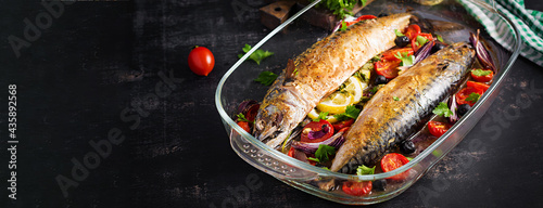 Baked mackerel with herbs and lemon and vegetables. Healthy dinner. Banner