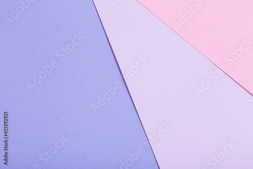 background of pink and violet pastel sheets of paper © Maya Kruchancova