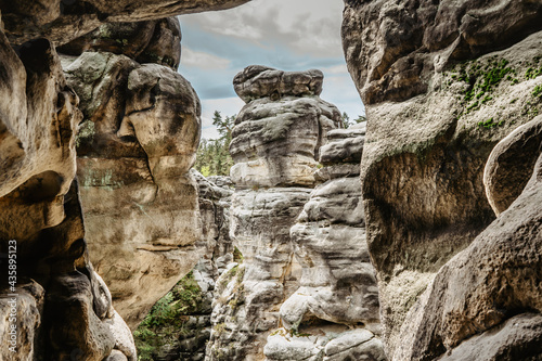 Ostas Nature Reserve and table mountain,Broumov region,Czech republic.View of rocks,caves,bizarre sandstone formations.Small natural town with labyrinth of rocks.Protected area.Romantic rocky canyon photo