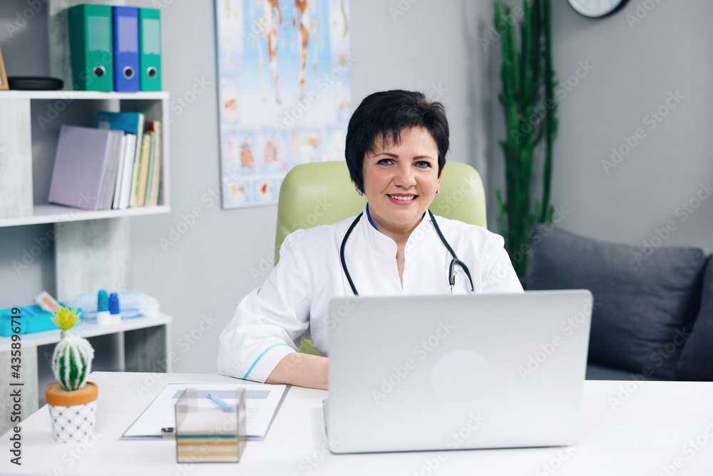 Confident woman wear white medical coat with stethoscope looking at camera. Happy lady professional medic clinic staff female nurse or doctor posing for close up portrait Confident woman wear white medical coat with stethoscope looking at camera. Happy lady professional medic clinic staff female nurse or doctor posing for close up portrait