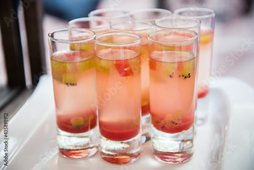 Wallpaper Mural Rows of pink cocktail glasses with floating fruit Torontodigital.ca