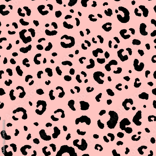 Abstract modern leopard seamless pattern. Animals trendy background. Black and pink decorative vector illustration for print  card  postcard  fabric  textile. Modern ornament of stylized skin
