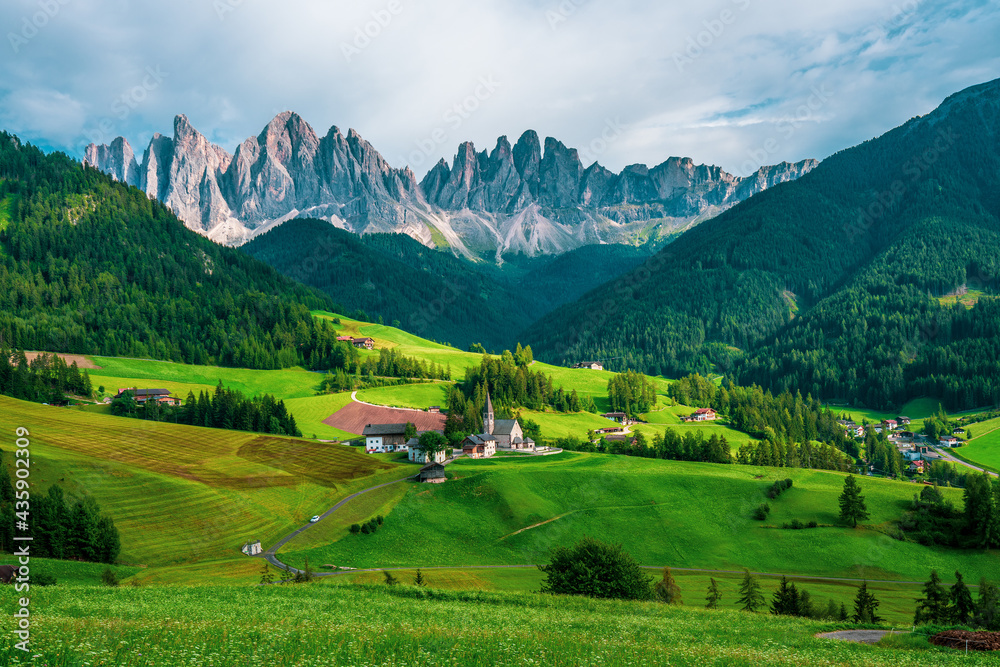 Panoramic view of the Church of St. Magdalena in the Dolomites, Italy.