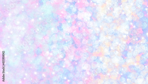 Bright pastel sparkling background. Glitter star dust. Defocused colorful design.