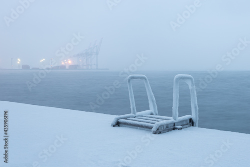 Winter Wharf: Odessa's Frozen Pier and Seaport View