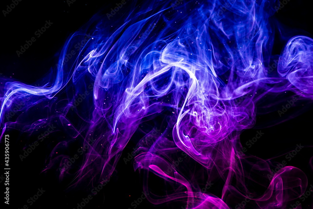 Colored smoke on black background