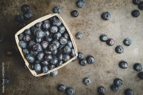 Fresh blueberries on a dark surface