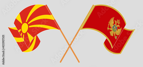 Crossed and waving flags of North Macedonia and Montenegro