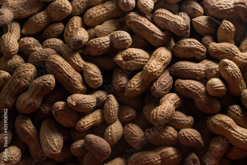 background of peanuts in shells. background of nuts