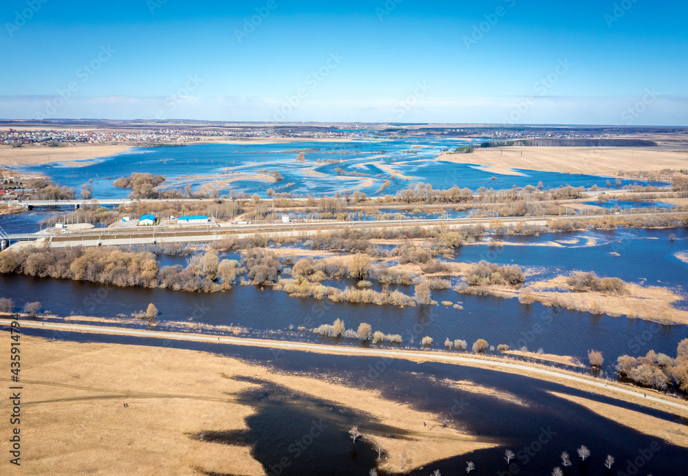 Aerial panorama of fields with the flooded rivers Klyazma and Nerl. Spring landscape near Vladimir, Rusiia.