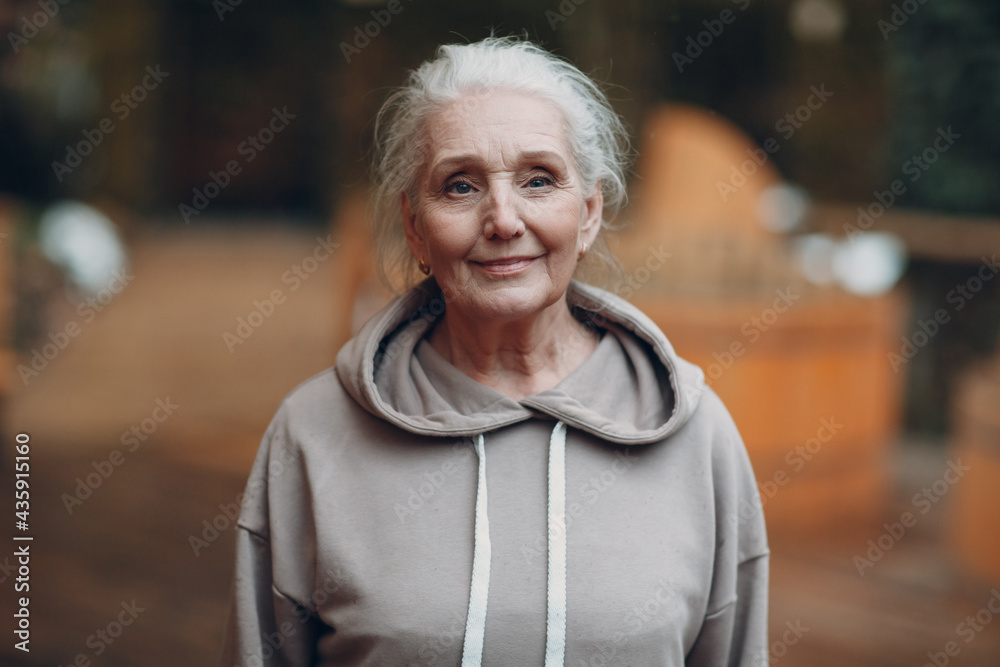 Portrait of mature gray haired old woman outdoor Portrait of mature gray haired old woman outdoor