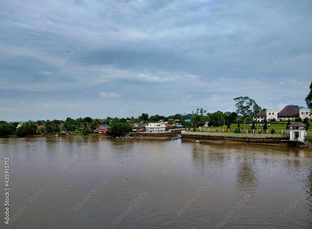 View of The Astana and Kuching City from the river. City Waterfront. Borneo Island. Sarawak. Malaysia. South-East Asia