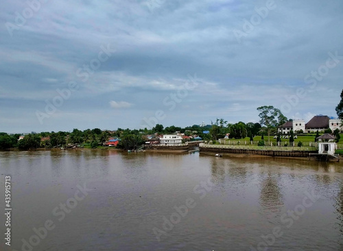 View of The Astana and Kuching City from the river. City Waterfront. Borneo Island. Sarawak. Malaysia. South-East Asia