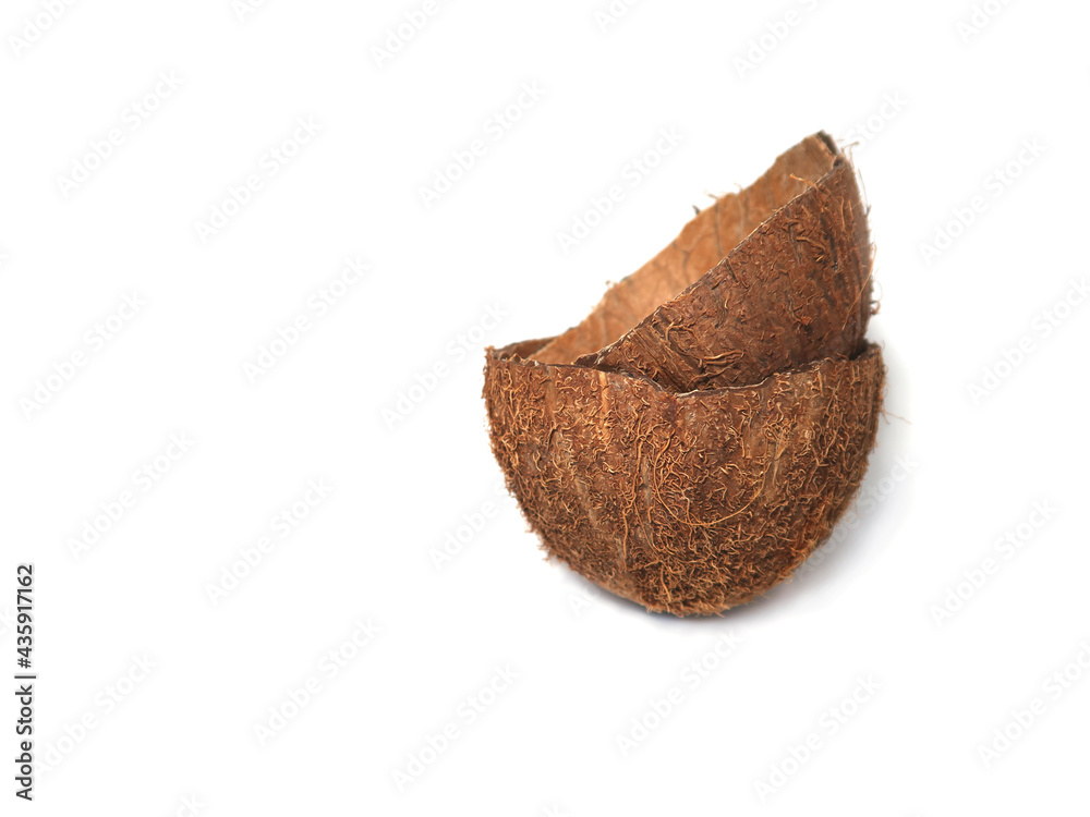 Fototapeta premium Coconut peel on a white background.