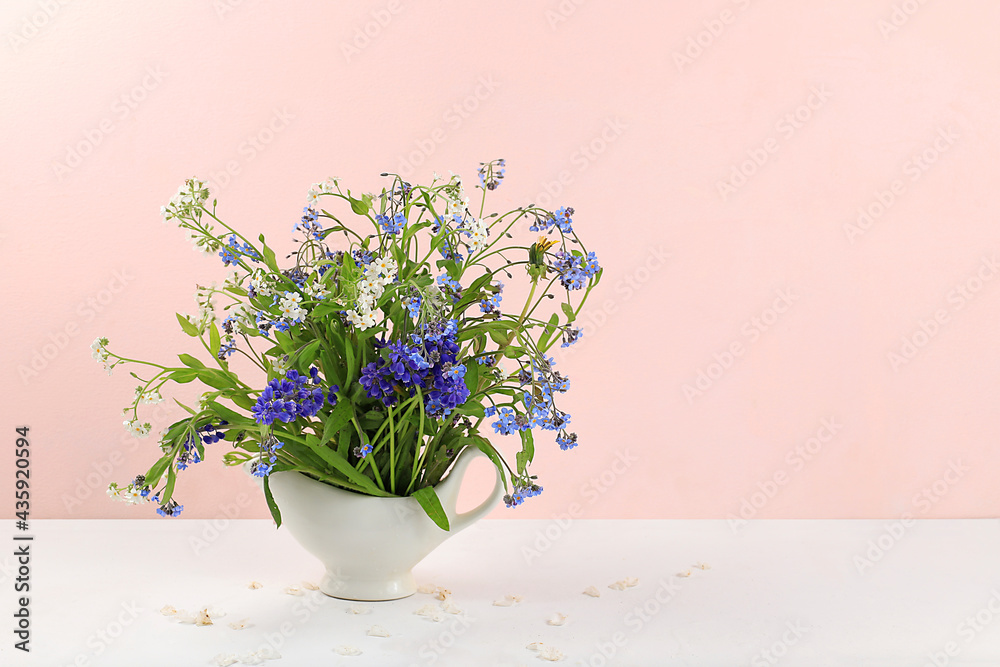 Home interior with decor elements, beautiful spring garden flowers in a vase on a light background, abstract flower arrangement, still life with place for text, floral card for birthday, wedding, Home interior with decor elements, beautiful spring garden flowers in a vase on a light background, abstract flower arrangement, still life with place for text, floral card for birthday, wedding,