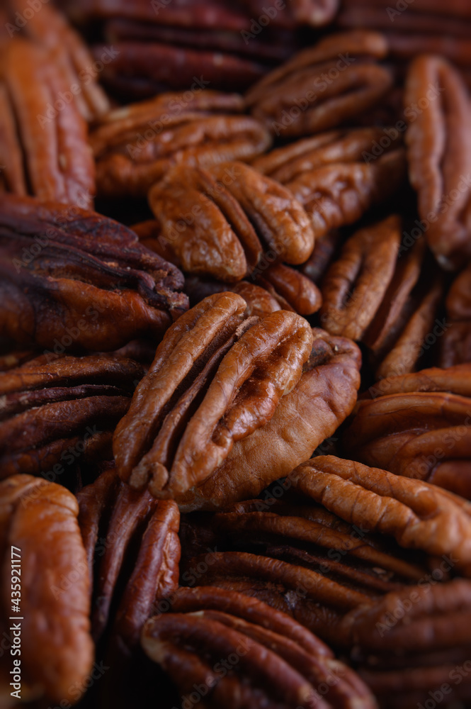 pecan nuts background vertical close-up hd pecan nuts background vertical close-up hd