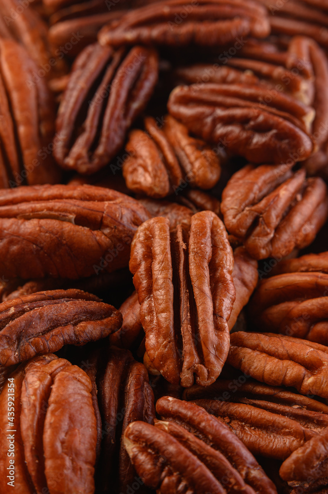 pecan nuts background vertical close-up hd pecan nuts background vertical close-up hd