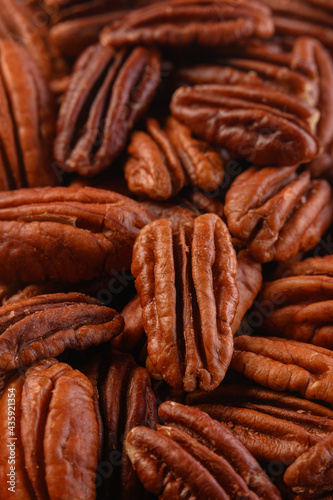 pecan nuts background vertical close-up hd
