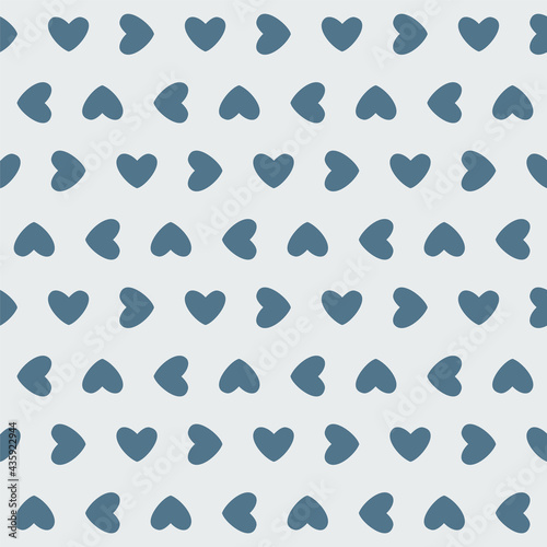 Cute hygge inspired seamless pattern with hearts. Muted blue and gray colors for home interior or wrapping paper or fabric. Cozy endless background ornament for valentines day or romantic holiday.