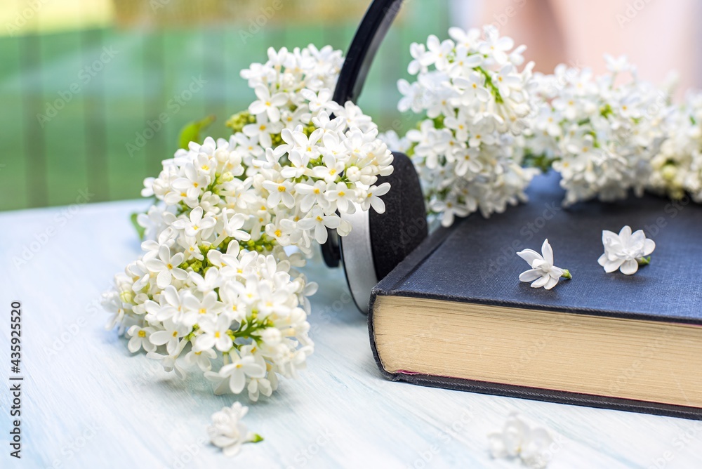 Audio book and headphones on the table