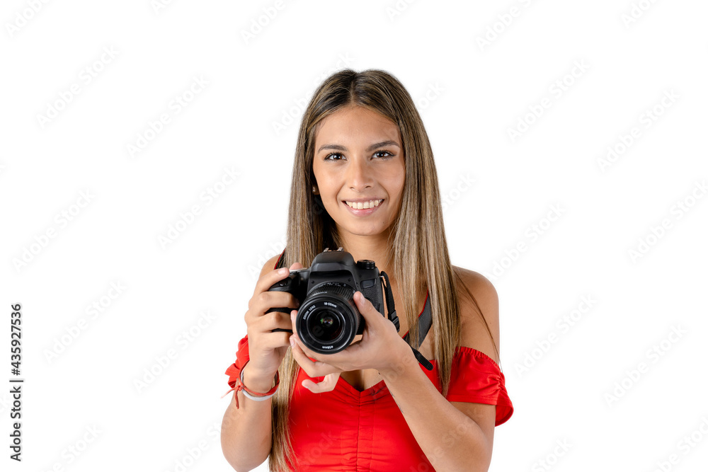 Young female photographer posing smiling with her camera in her hand. Concept work, visual communication. Young female photographer posing smiling with her camera in her hand. Concept work, visual communication.