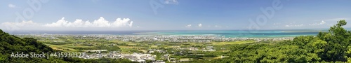 Okinawa,Japan - May 24, 2021: Panoramic view of Ishigaki City and Ishigaki port, Okinawa, Japan, from Banna park 