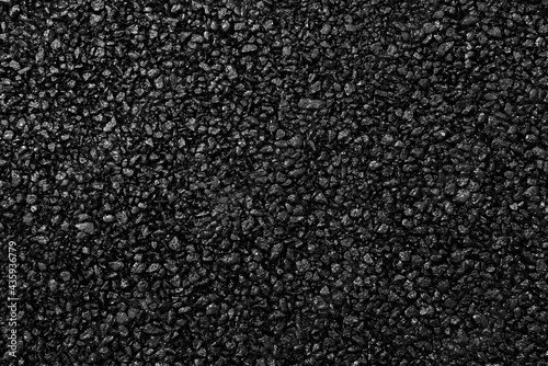 Asphalt pavement with a beautiful black and gray texture lit by a soft light. Japanese style.