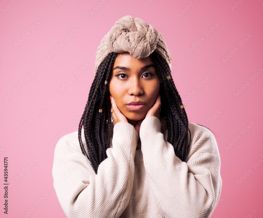 Happy Biracial Woman Posing In Front Of Pink Background Happy Biracial Woman Posing In Front Of Pink Background