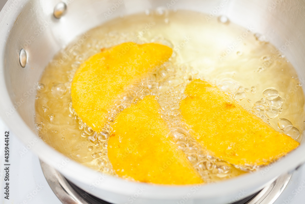 Preparation of a traditional dish from el Valle del Cauca in Colombia called empanada Preparation of a traditional dish from el Valle del Cauca in Colombia called empanada
