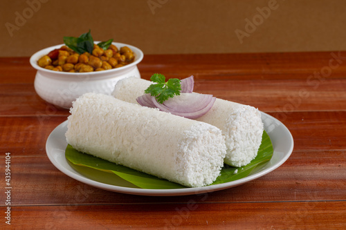 White rice puttu with chana masala curry photo