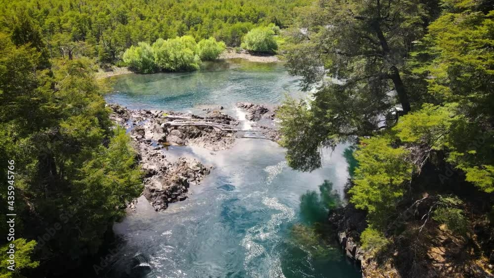 Aerial flyover paradise on earth showing hidden lake surrounded by green nature in Patagonia, Argentina Aerial flyover paradise on earth showing hidden lake surrounded by green nature in Patagonia, Argentina