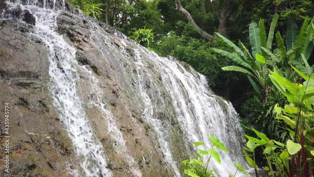 Beautiful flowing waterfall feature at Namtok Wang Ta Krai nature park in Nakhon Nayok, Thailand. Beautiful flowing waterfall feature at Namtok Wang Ta Krai nature park in Nakhon Nayok, Thailand.