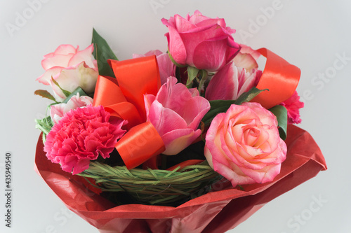 Fototapeta Naklejka Na Ścianę i Meble -  Mother's day bouquet background. Bunch of flowers isolated. Pink rose background. Woman's day bouquet background.