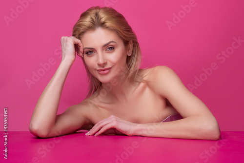 Beauty woman face portrait in studio. Beautiful girl with clean skin, natural make-up.