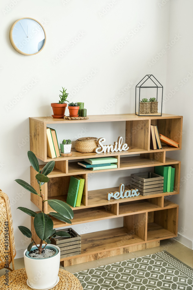 Fototapeta premium Interior of modern room with shelf unit